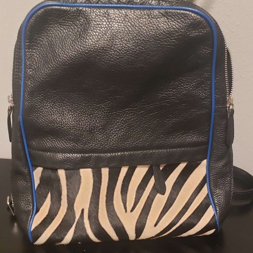 Claudia Firenze New zebra n black leather backpack 12in w x 14in h
